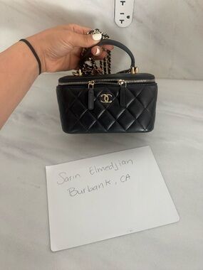 CHANEL Black Quilted Vanity Mini Bag with Chain-Top Handle